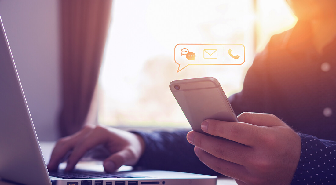 Abbey Court Solicitors | New Website LaunchPerson holding smartphone with contact communication icons displayed Person holding smartphone with contact communication icons displayed