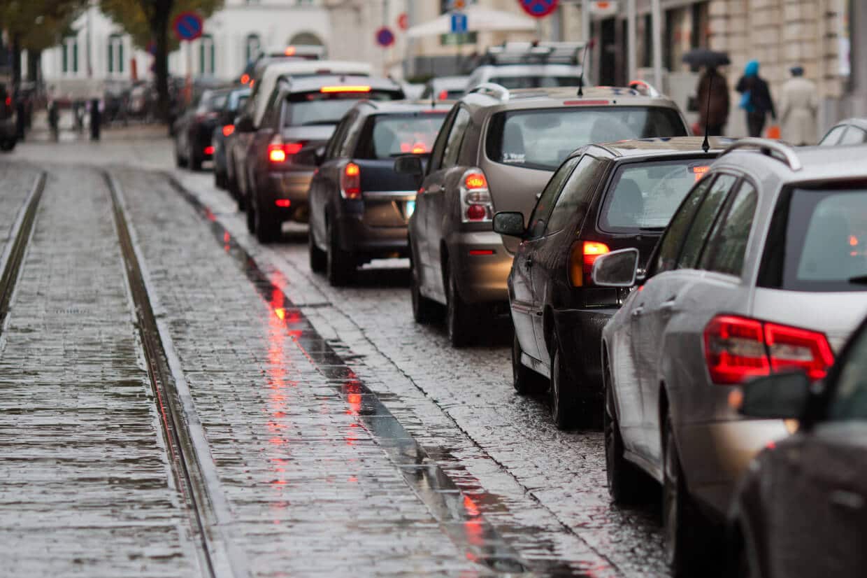 Abbey Court Solicitors | Road Traffic AccidentsQueue of taxis with lit brake lights on wet cobbled street Queue of taxis with lit brake lights on wet cobbled street