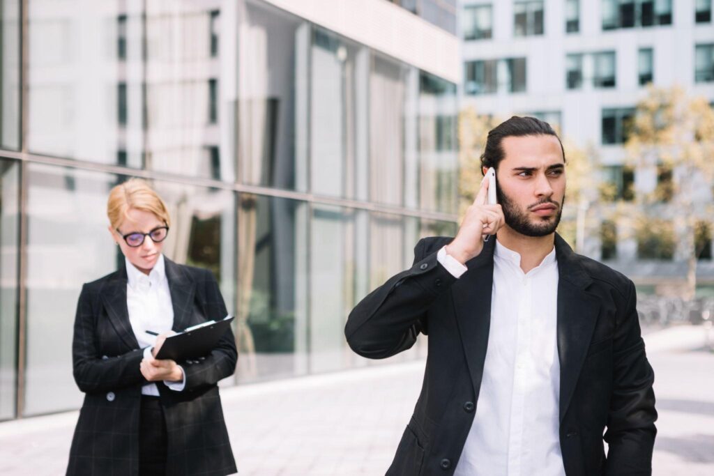 Abbey Court Solicitors | Landlord and Tenant Disputes: When to Call a Solicitor in AccringtonBusinesswoman with tablet and man on phone in urban setting Businesswoman with tablet and man on phone in urban setting